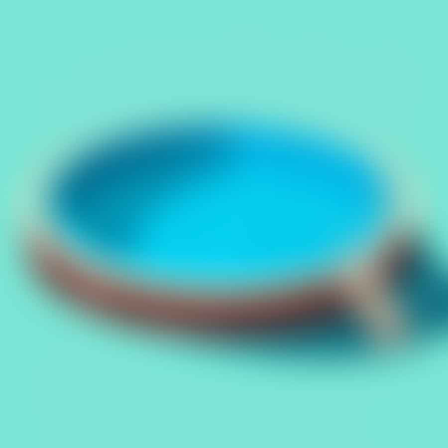 A measuring tape stretched across the diameter of an above ground pool.