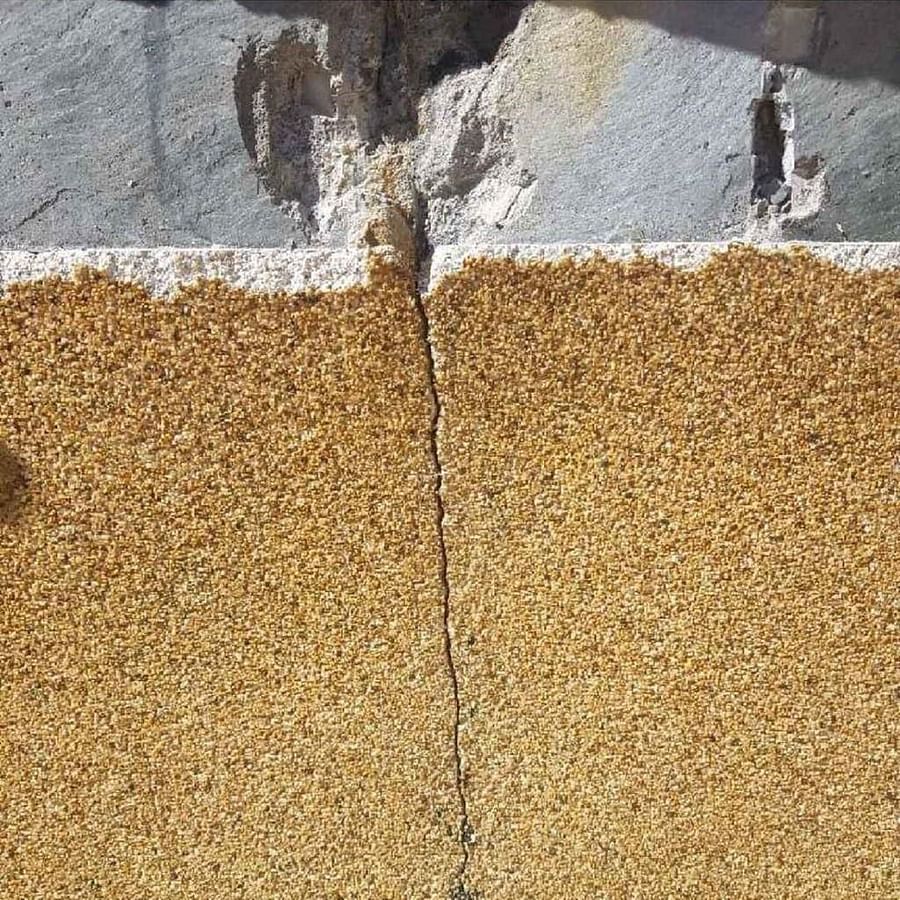 Swimming pool with visible cracks indicating potential leakage