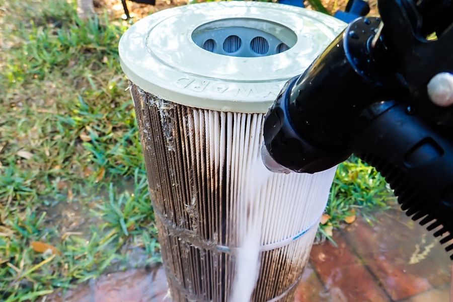 Pool filter cleaning solution